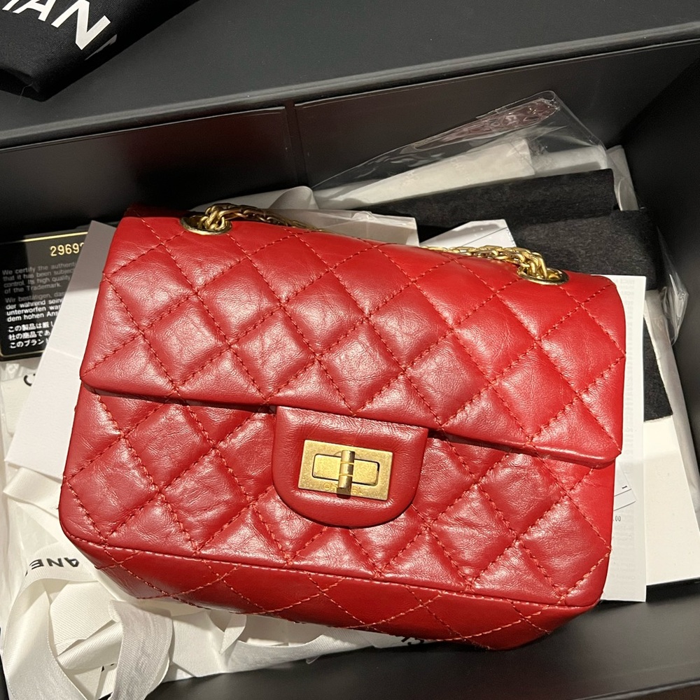 Authentic Chanel 2.55 mini aged calfskin in Red